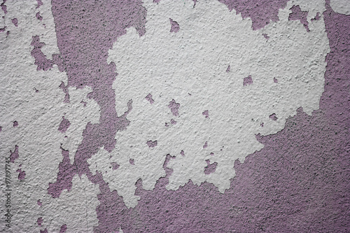 grunge peeling painted concrete wall. © sakhorn38