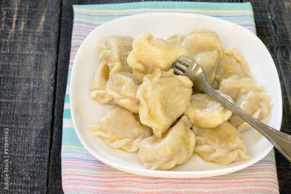 Dumplings with potato in rustic style, selective focus. Dumplings with potato in rustic style, selective focus.