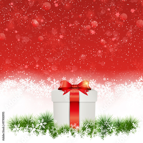Christmas gift nestled in snow