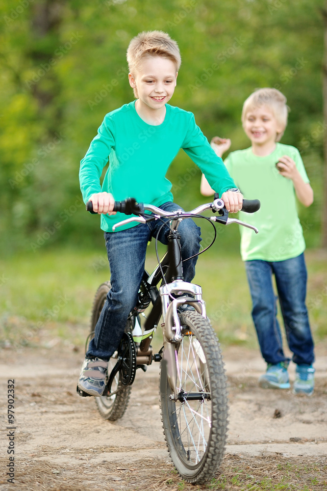 Portrait of two boys in the summer outdoors Portrait of two boys in the summer outdoors