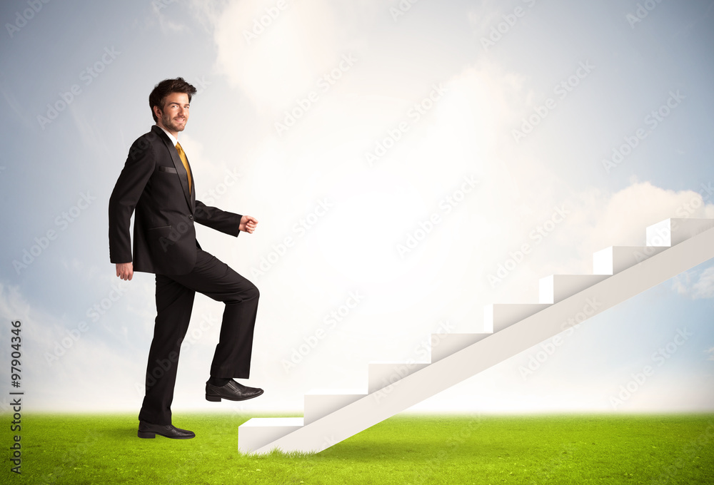 Business person climbing up on white staircase in nature Business person climbing up on white staircase in nature