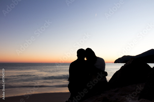 Loving Couple sunset at the beach