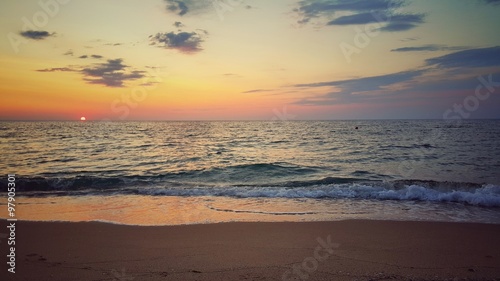 Fototapeta Naklejka Na Ścianę i Meble -  Lonely beach. Beautiful sunrise over the beach.