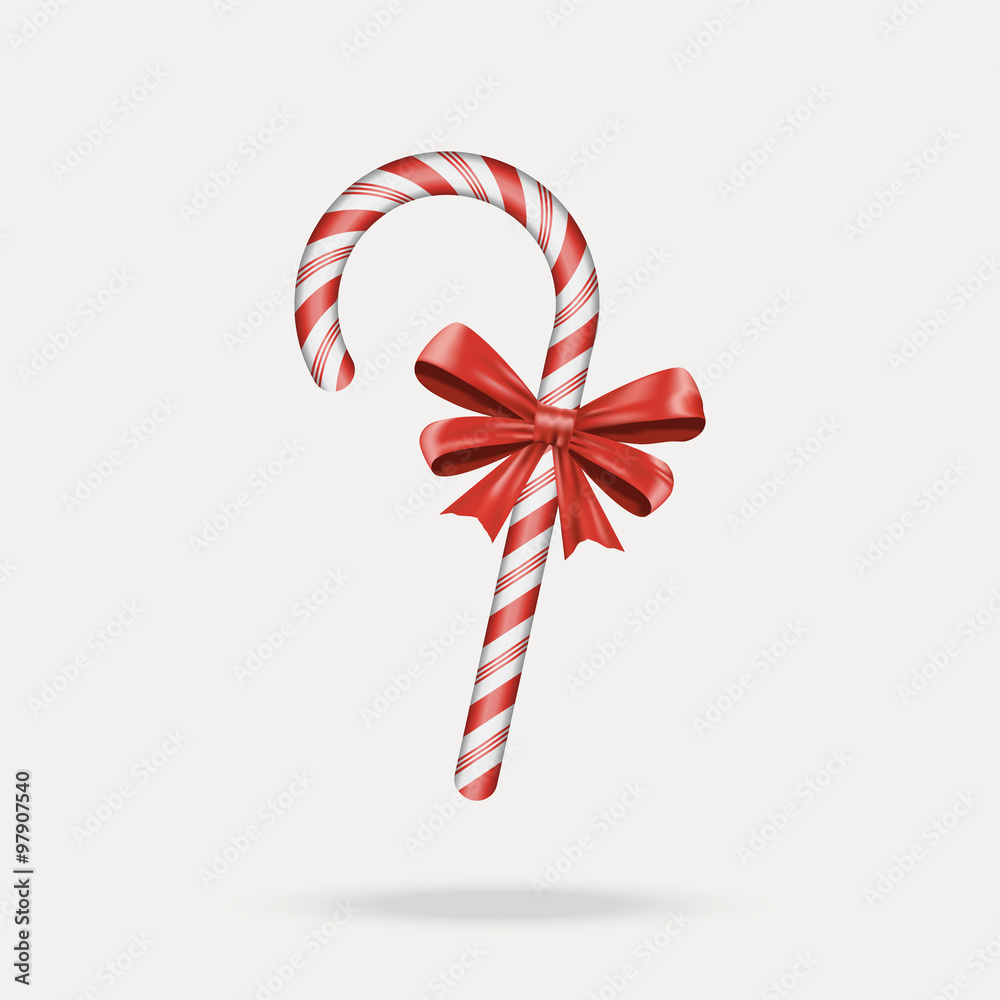 Christmas Candy Cane with Red Bow Isolated on White Background. Christmas Candy Cane with Red Bow Isolated on White Background.