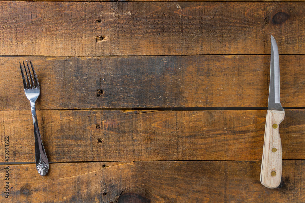 fork and knife on wood fork and knife on wood
