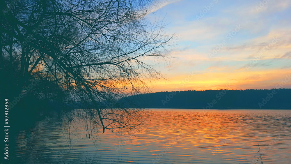 Beautiful lake at sunset in warm weather Beautiful lake at sunset in warm weather