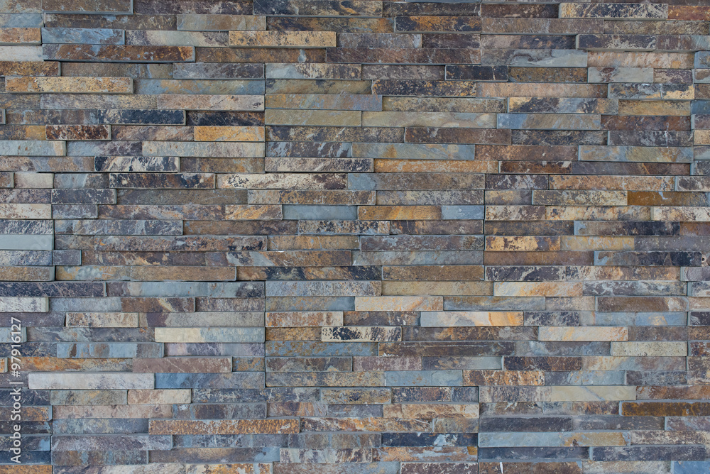 Modern stone wall background texture.