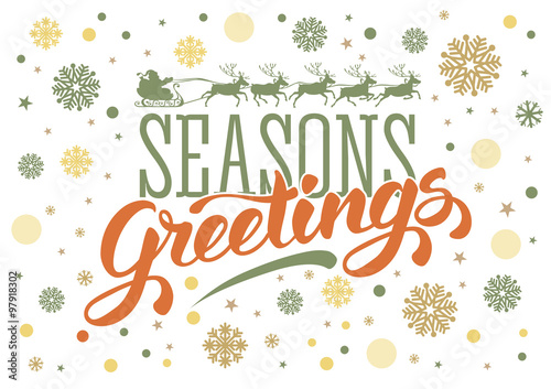 Seasons greetings. Vintage card for winter holidays. Hand lettering calligraphic inscription by brush. Snowflakes on white background. Santa sleigh reindeer silhouette. 