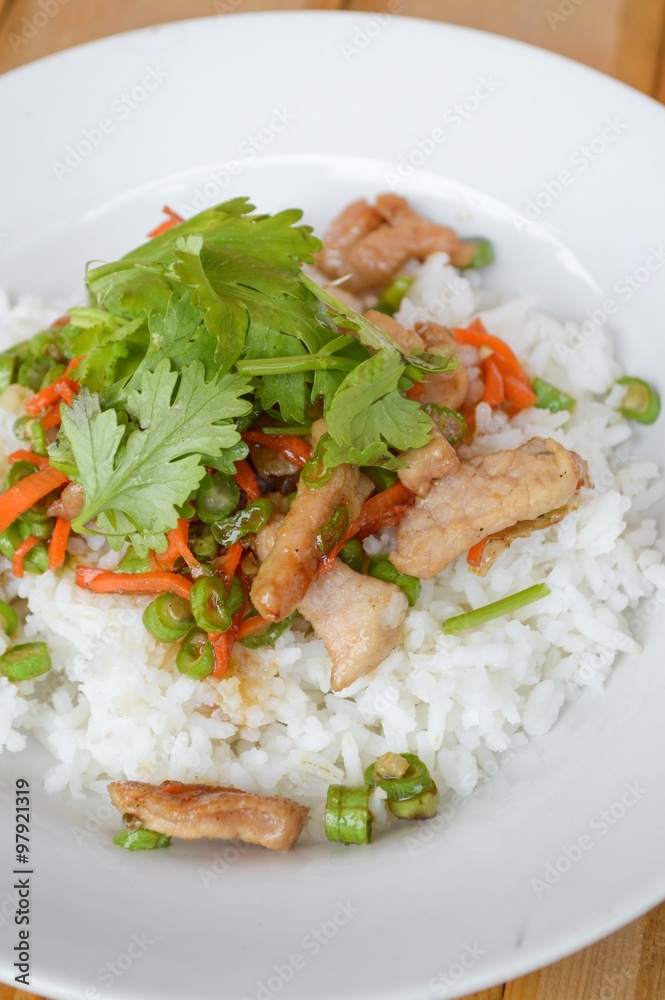 pork and vegetable fried on hot rice - Thailand healthy food pork and vegetable fried on hot rice - Thailand healthy food