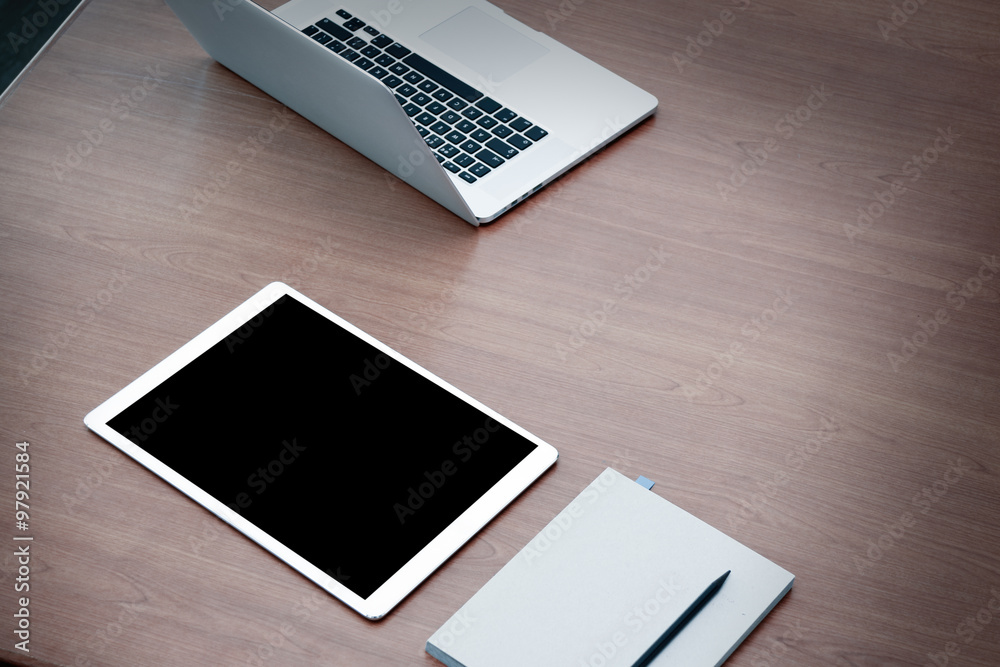 work station open laptop with blank screen digital tablet on woo work station open laptop with blank screen digital tablet on woo