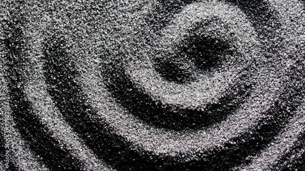 Black sand grunge background. Сlose-up 4K UHD 2160p footage.

