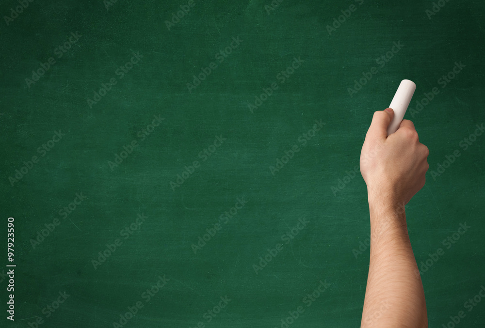 Hand writing on clean blackboard Hand writing on clean blackboard