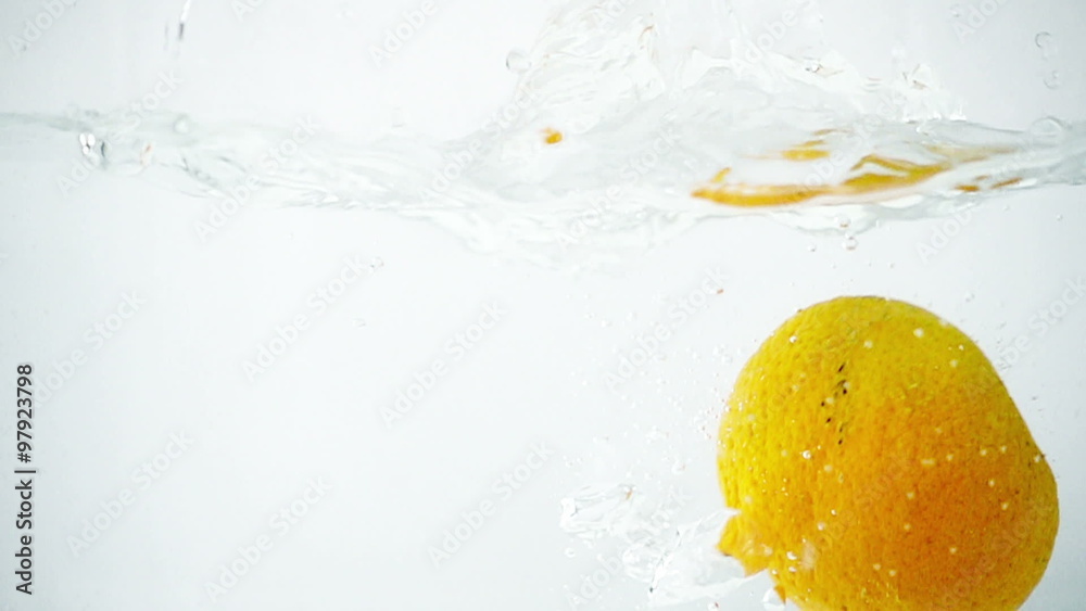 Two tangerines being dropped in succession into a body of water in ultra slow motion (500 frames per second) against a seamless white background.
Two tangerines being dropped in succession into a body of water in ultra slow motion (500 frames per second) against a seamless white background.