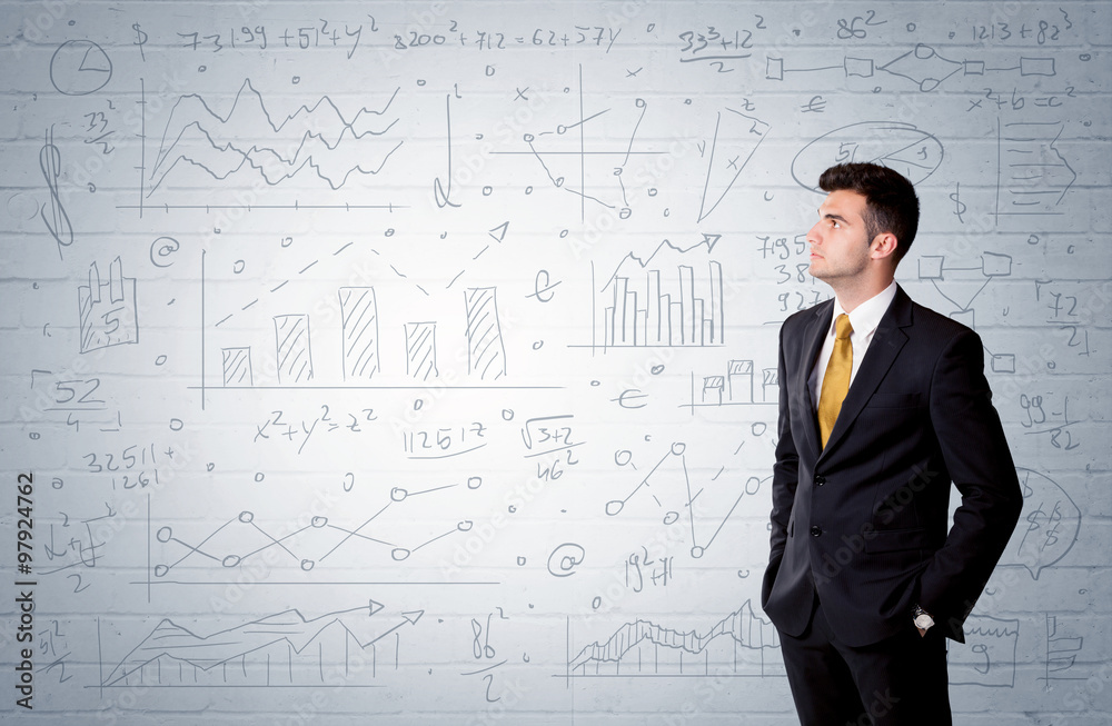 Salesman standing with drawn graph charts Salesman standing with drawn graph charts