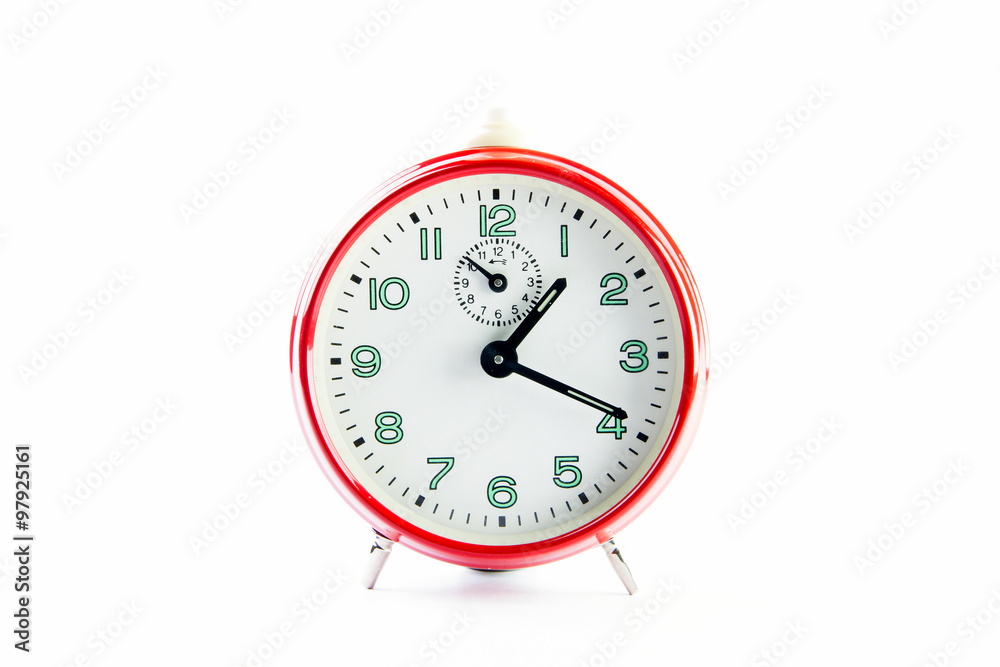 Red alarm clock on the white background. Red alarm clock on the white background.