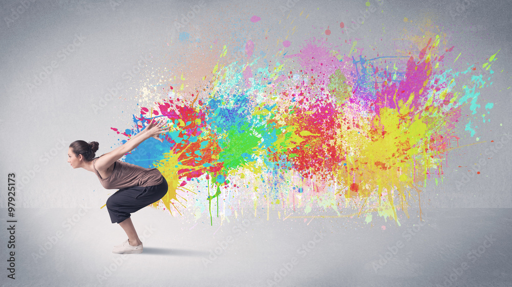 Young colorful street dancer with paint splash Young colorful street dancer with paint splash