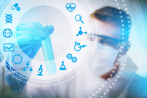 Fotografie Biotechnology researcher concept or biotech science, close up of male biologist doing experiment