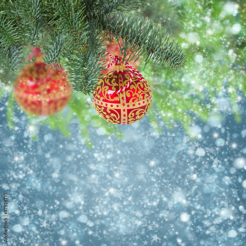 christmas ball hanging on evergreen tree