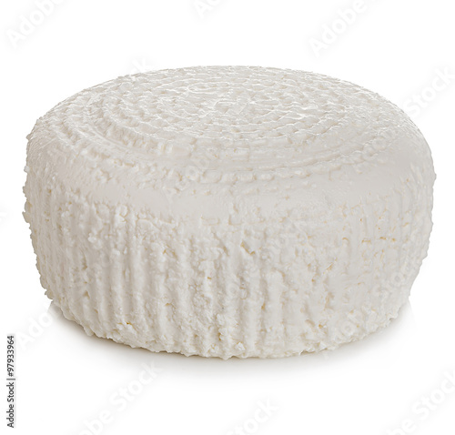 Wheel of traditional fresh cottage cheese close-up isolated on a white background.