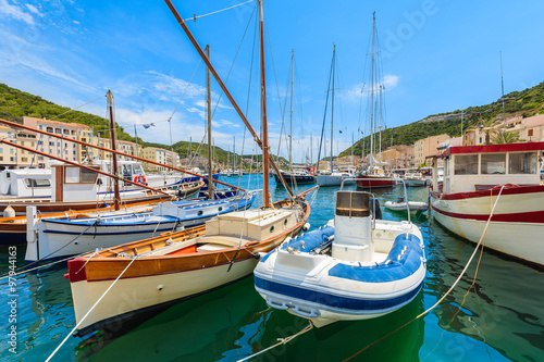 Colorful typical fishing boat in Bonifacio port, Corsica island, France