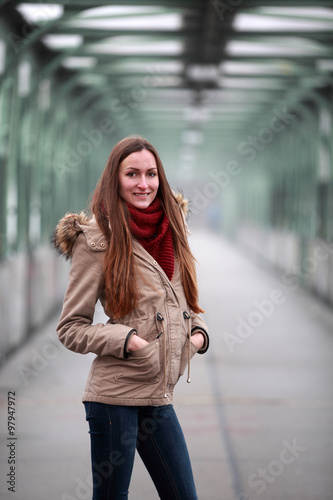 Beautiful brunette girl in winter jacket