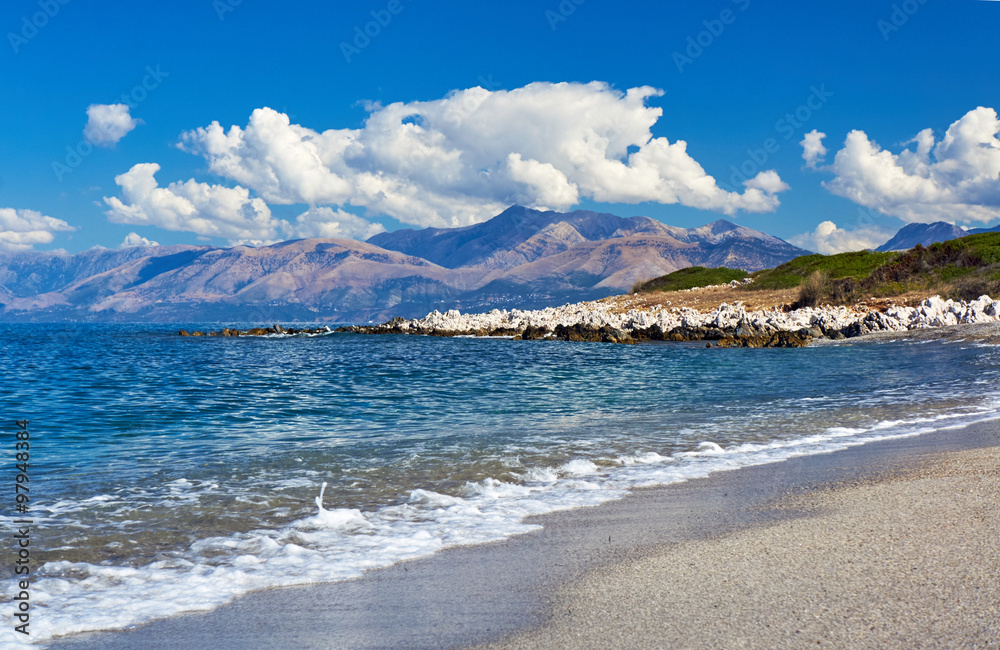 coast of island of Corfu with white rock.