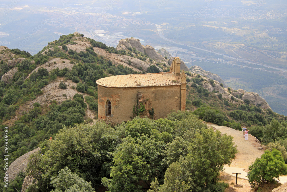 MONTSERRAT, SPAIN - AUGUST 28, 2012: Saint Joan hermitage in Montserrat Mountain, Spain. Benedictine abbey Santa Maria de Montserrat in Monistrol de Montserrat