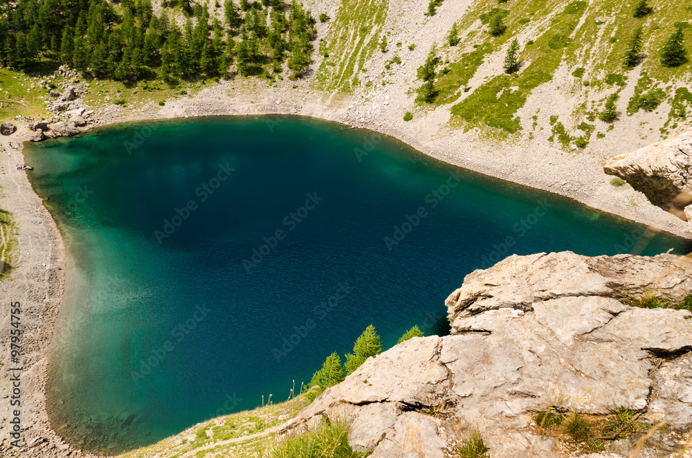 areal view of the black lake, a glacial lake on the alps surrounding the Maira Valley, close to Turin