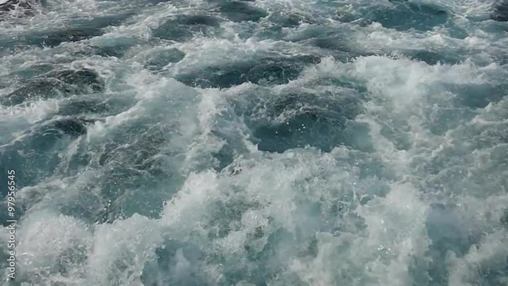 Powerful churning of water by boat motor is slow motion Powerful churning of water by boat motor is slow motion