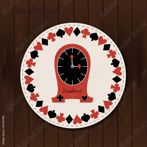 Clocks - drink coaster from Wonderland on Wooden Background. 