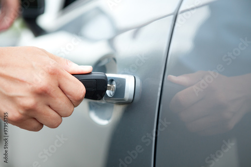 Woman Hand Holding Key Car to Unlock,