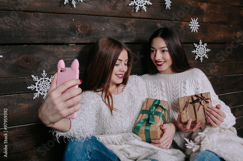 Two young girls make salfie photo