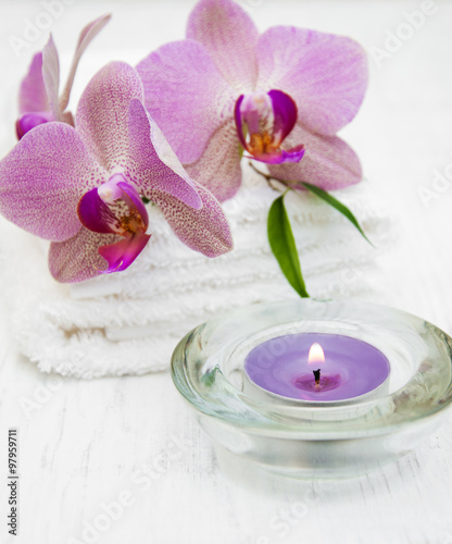 Pink orchids and towels