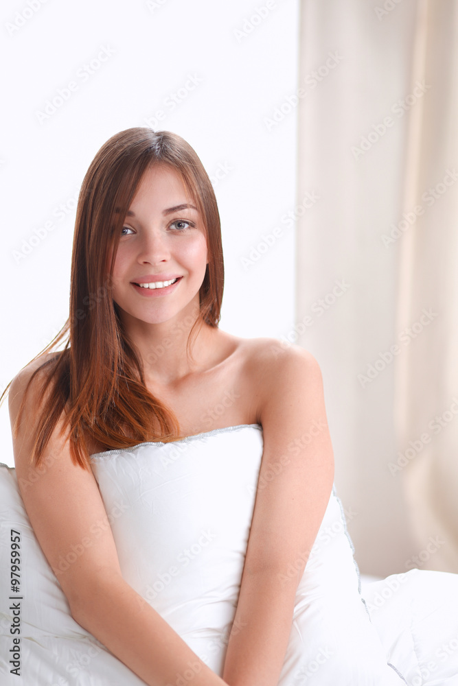 Portrait of beautiful woman on bed at bedroom Portrait of beautiful woman on bed at bedroom