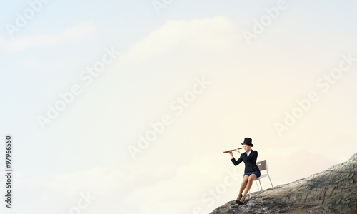 Girl in black cylinder