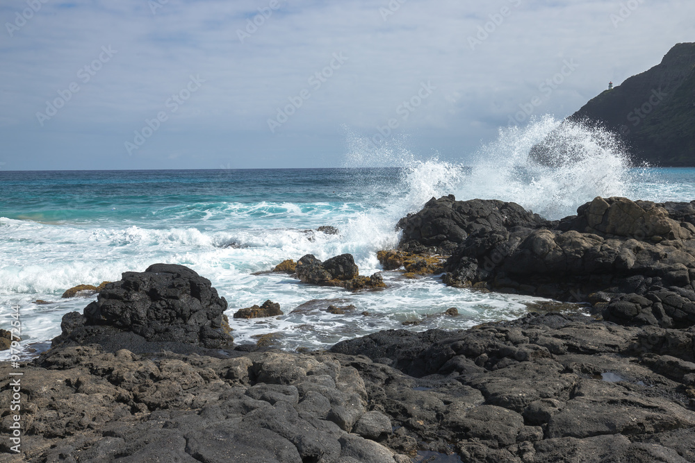 Ocean wave splash on rocks