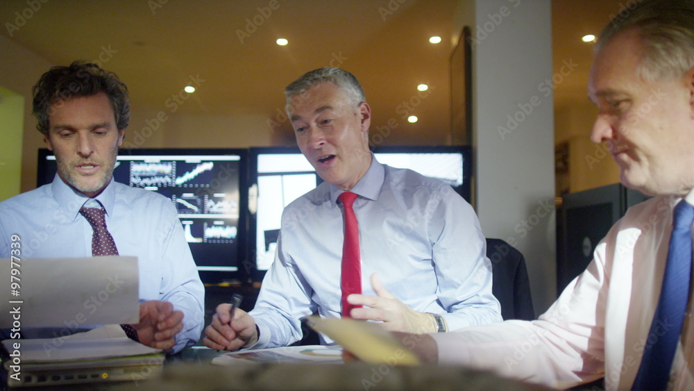 Group of engineers or architects discuss a building project