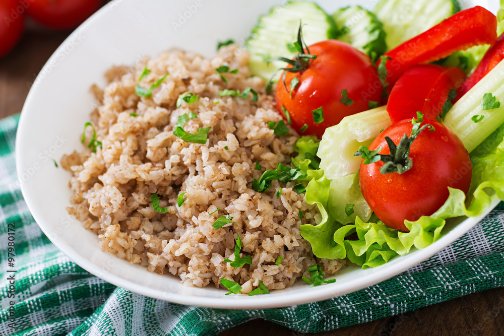 Porridge with fresh vegetables and lettuce. Healthy breakfast. Proper nutrition. Dietary menu. Porridge with fresh vegetables and lettuce. Healthy breakfast. Proper nutrition. Dietary menu.