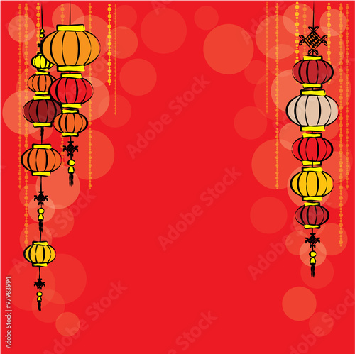 Frame of Chinese lanterns and bokeh on red