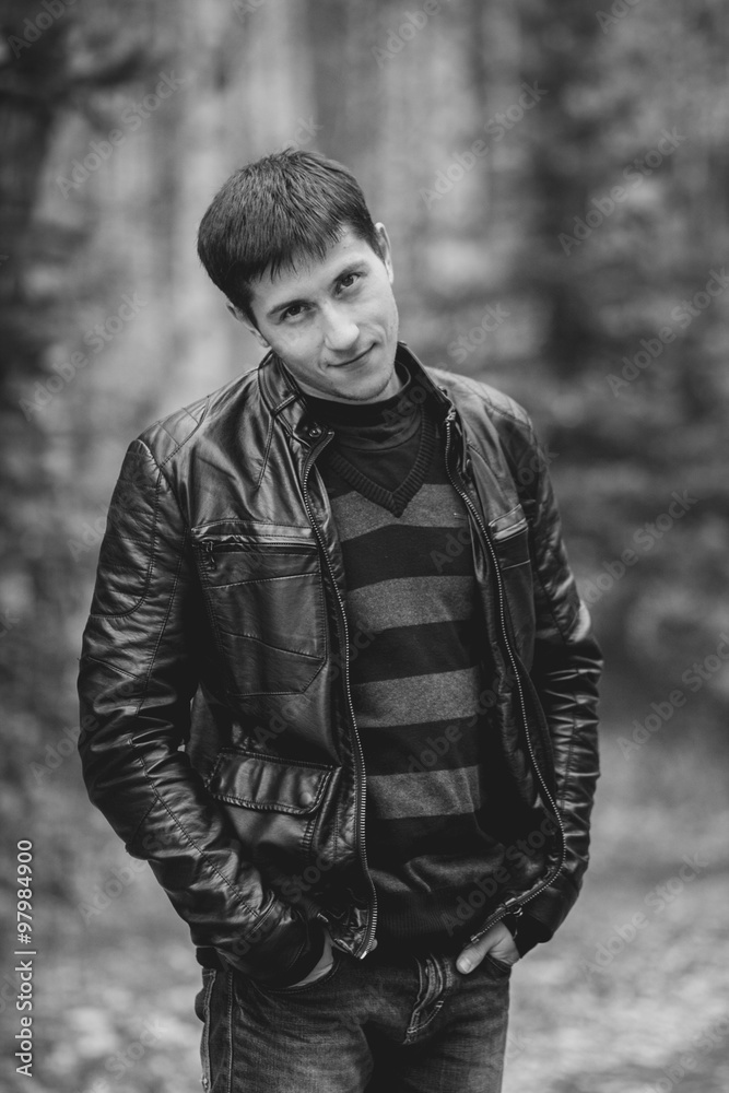 Smirking and flirting man outdoors Smirking and flirting man outdoors