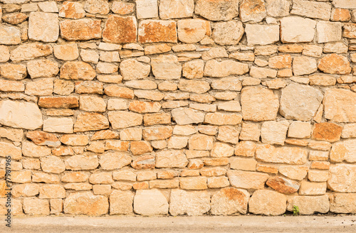 Alte Steinmauer Kulisse Stein Textur mit Gehweg