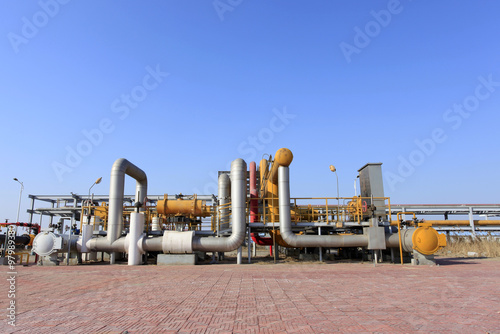 Oil field scene, oil pipelines and facilities