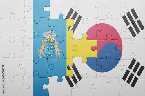 puzzle with the national flag of canary islands and south korea