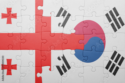 puzzle with the national flag of georgia and south korea