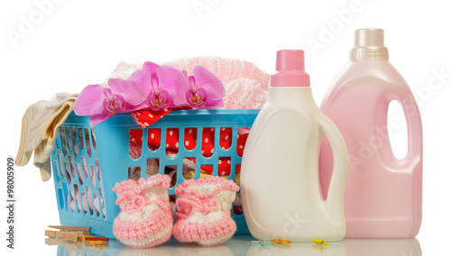 Detergent and baby's booties photo