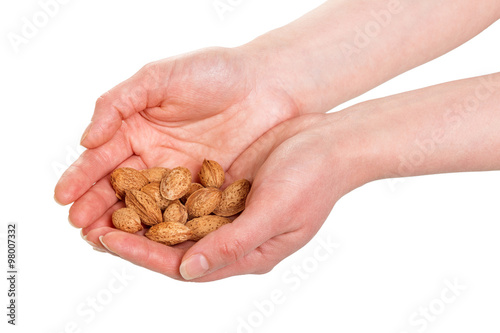 Almond nuts in hands