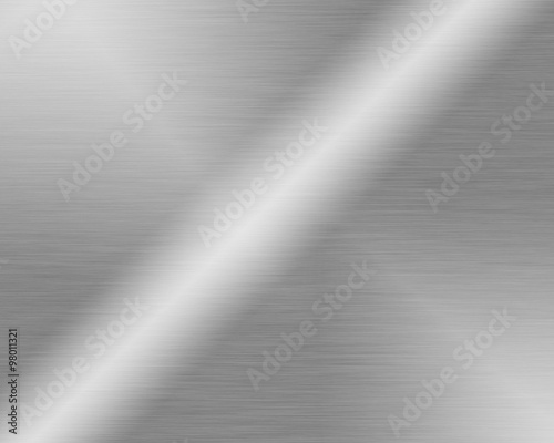 Metal background or texture of brushed steel plate with reflection