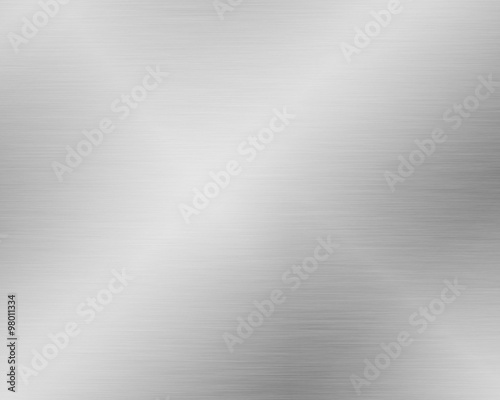 Metal background or texture of brushed steel plate with reflection
