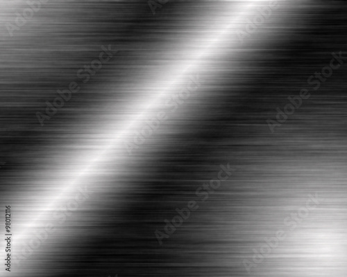 Metal background or texture of brushed steel plate with reflections Iron plate