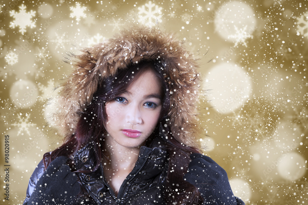 Girl with winter coat and defocused background Girl with winter coat and defocused background